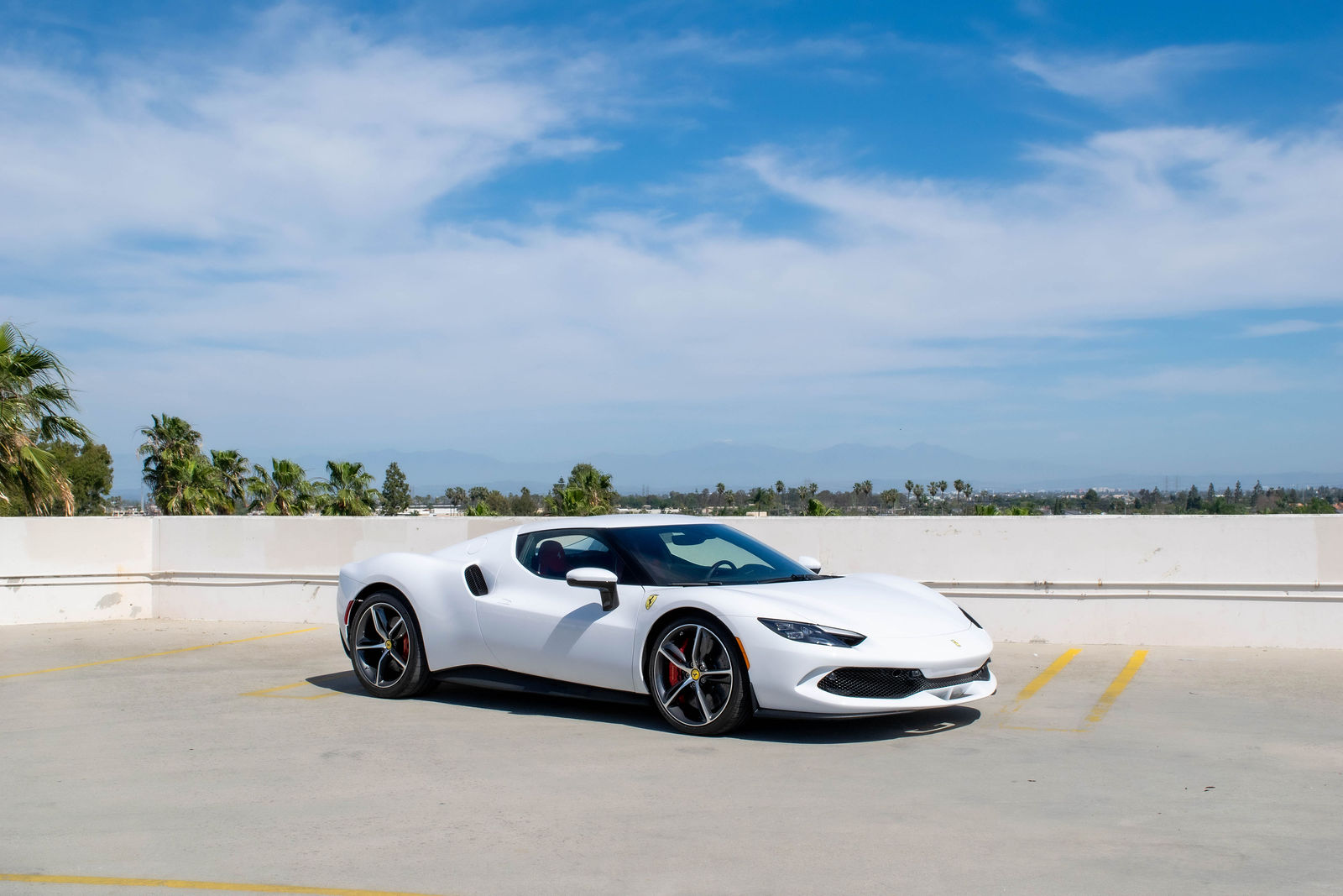 White Ferrari 296 GTB for rent in Orange County (view 3)