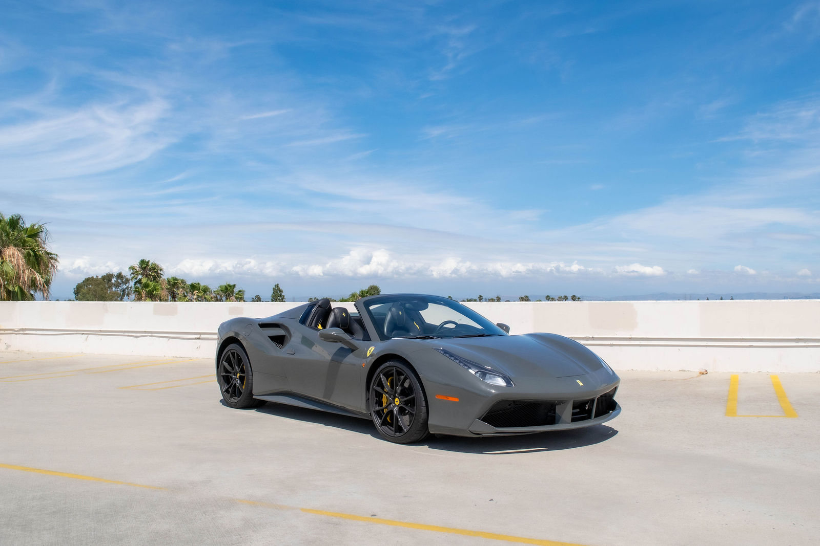 Grey Ferrari 488 Spider for rent in Orange County (view 2)