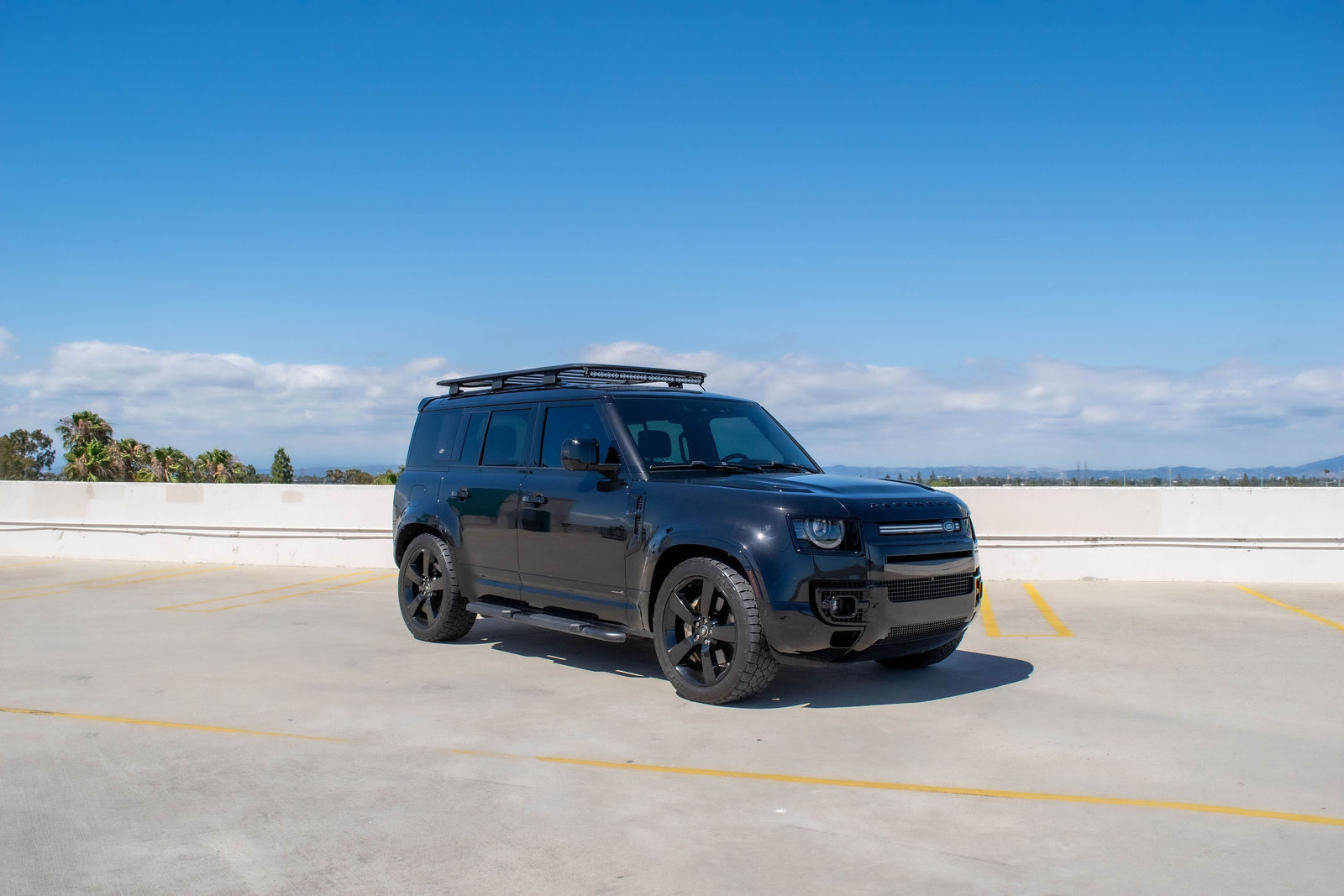 Black Land Rover Defender for rent in Orange County (view 3)