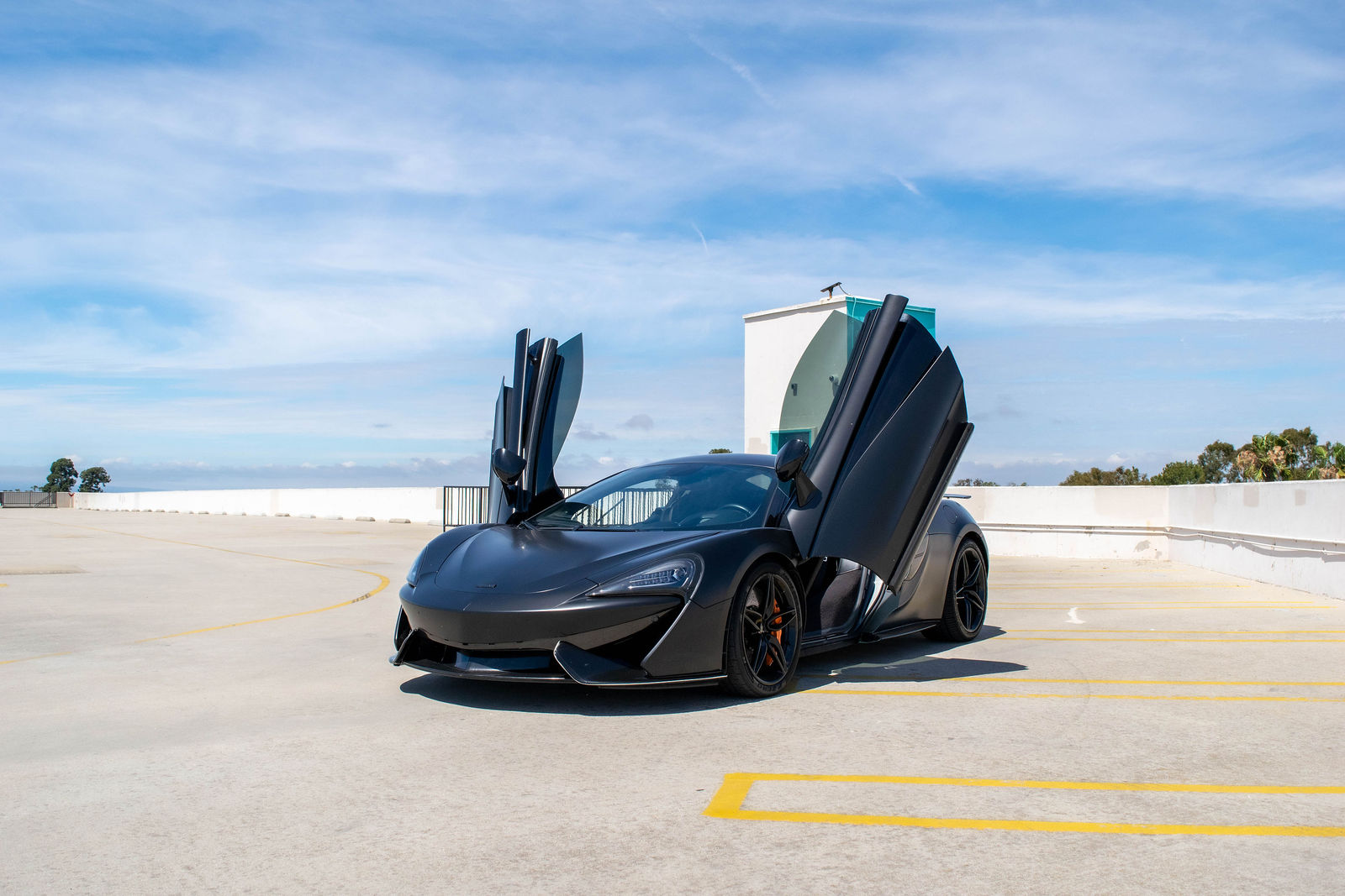 Black McLaren 570S for rent in Orange County (view 4)