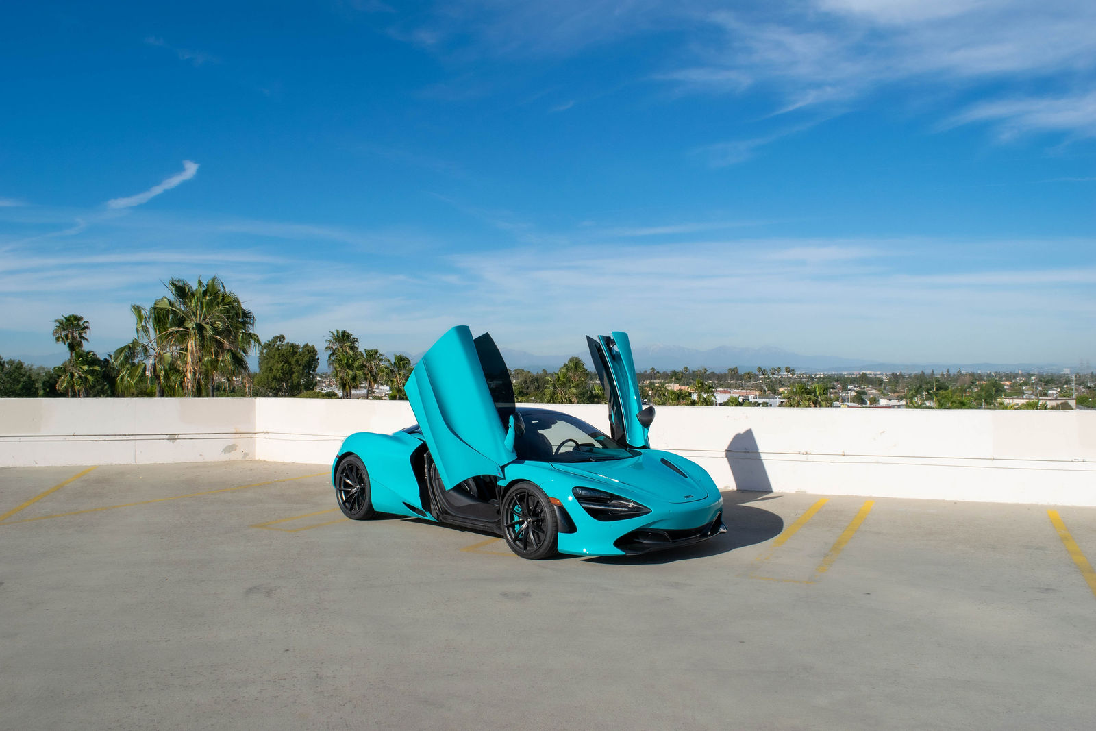 Turquoise McLaren 720S for rent in Orange County (view 2)