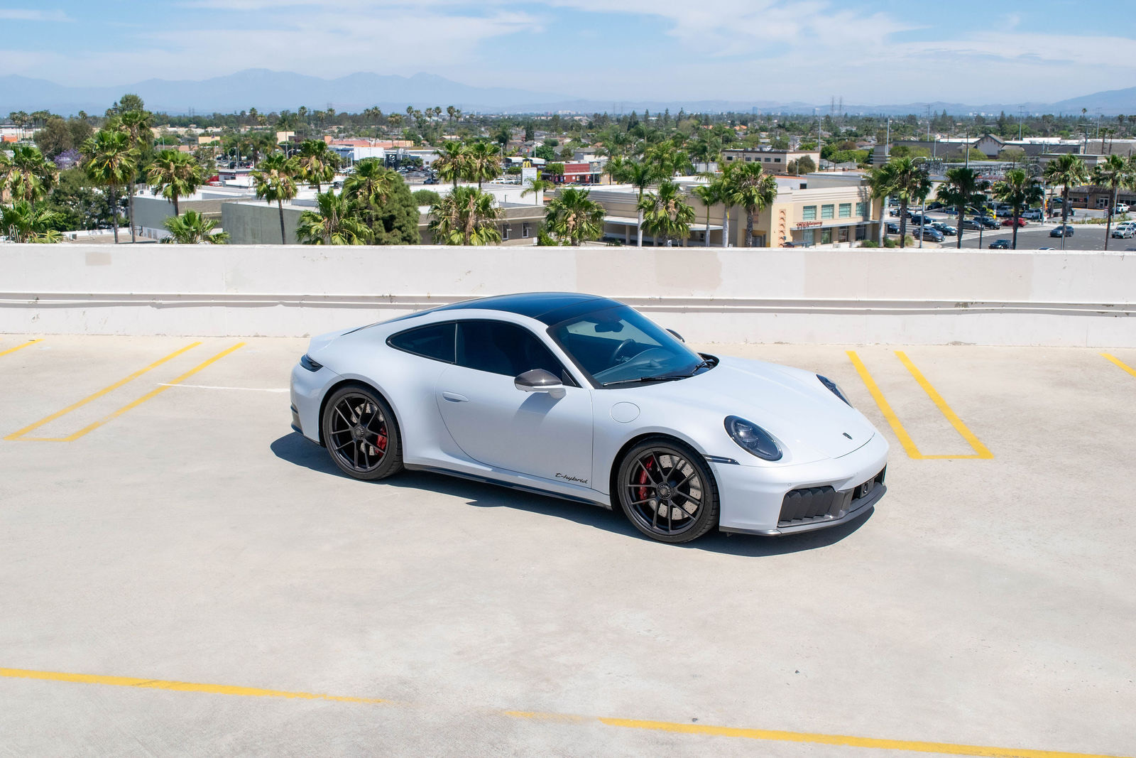 Grey Porsche 911 Carrera for rent in Orange County (view 4)