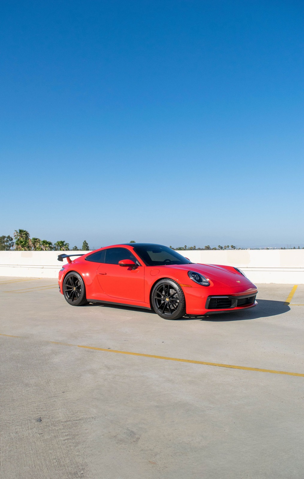 Red Porsche 911 Carrera for rent in Orange County (view 3)