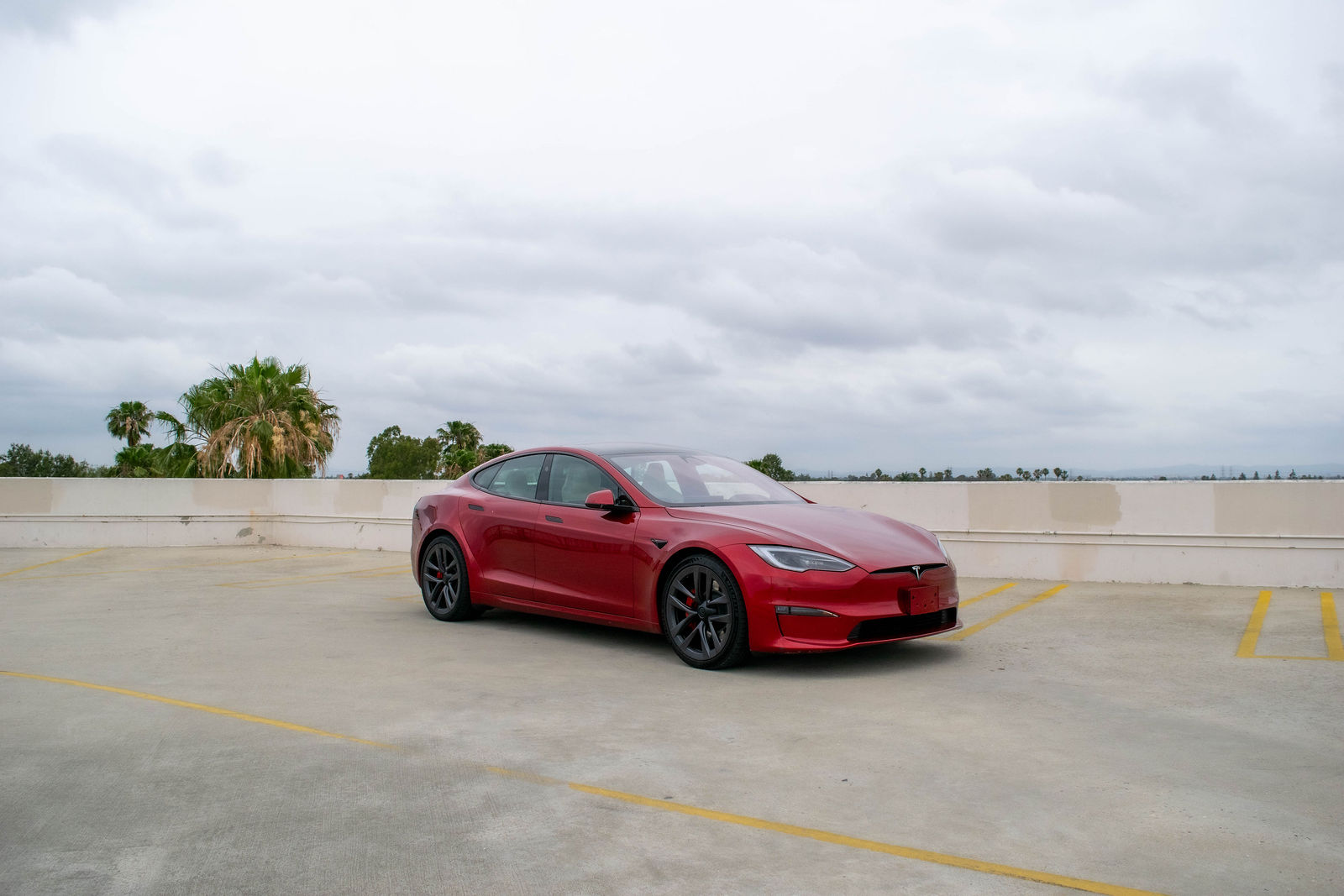 Red Tesla Model S for rent in Orange County (view 2)